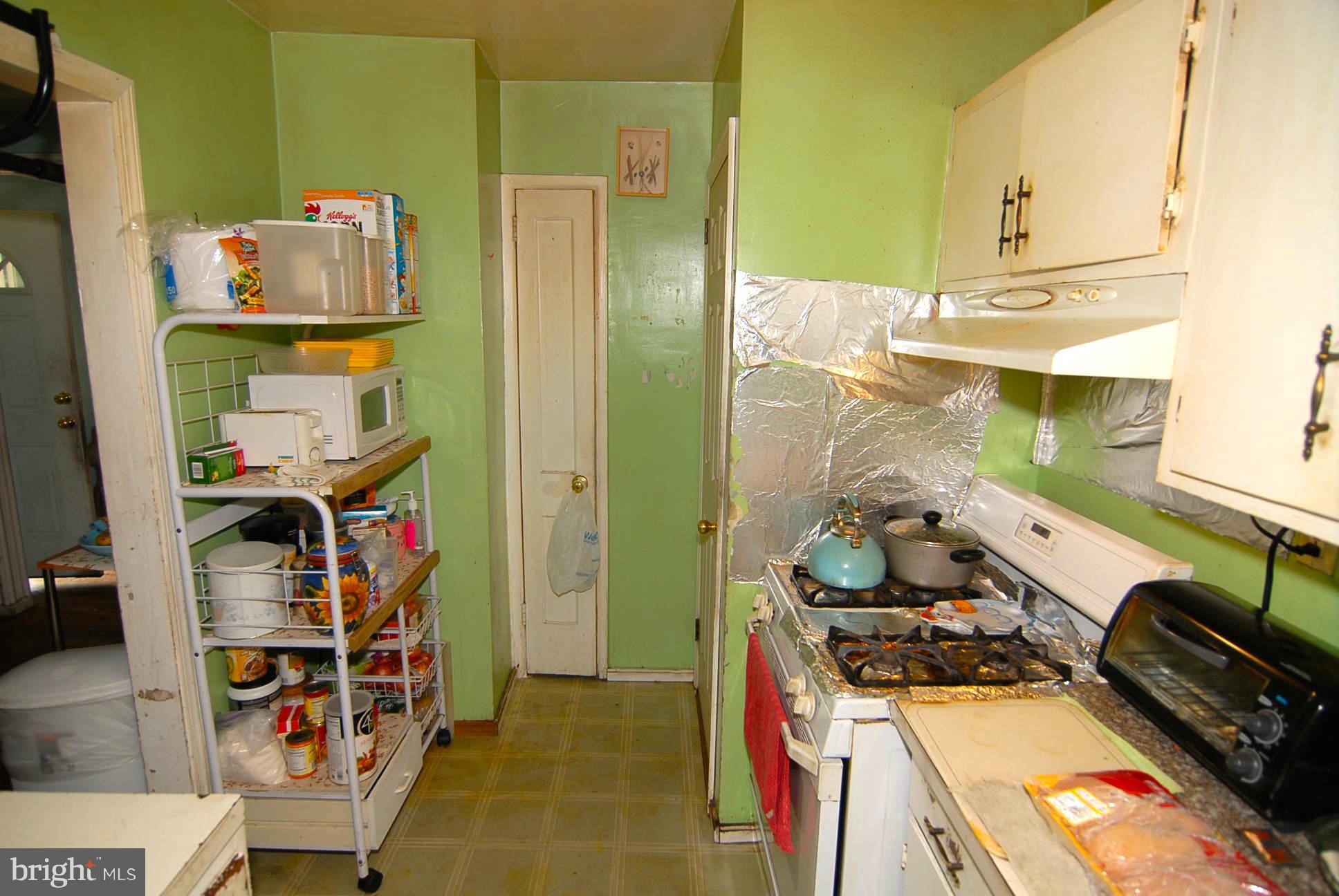 12009 Centerhill Street Silver Spring, MD 20902 - Photo 6 of 9 a room with storage and utility