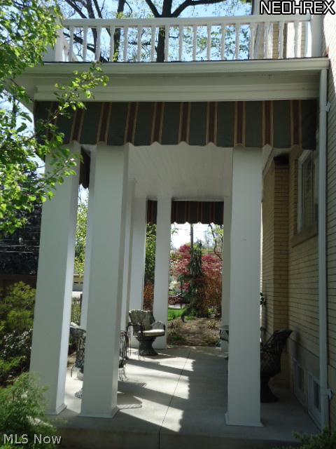 924 Raff Road Southwest Canton, OH 44710 - Photo 20 of 25 Darling cozy side porch, tucked away on the far side of the home.