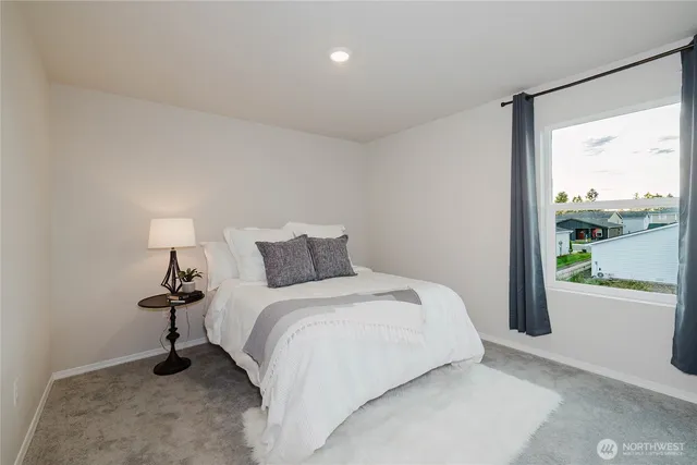 a view of a bedroom with window