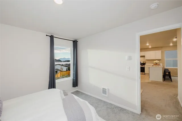 a bedroom with a bed and closet