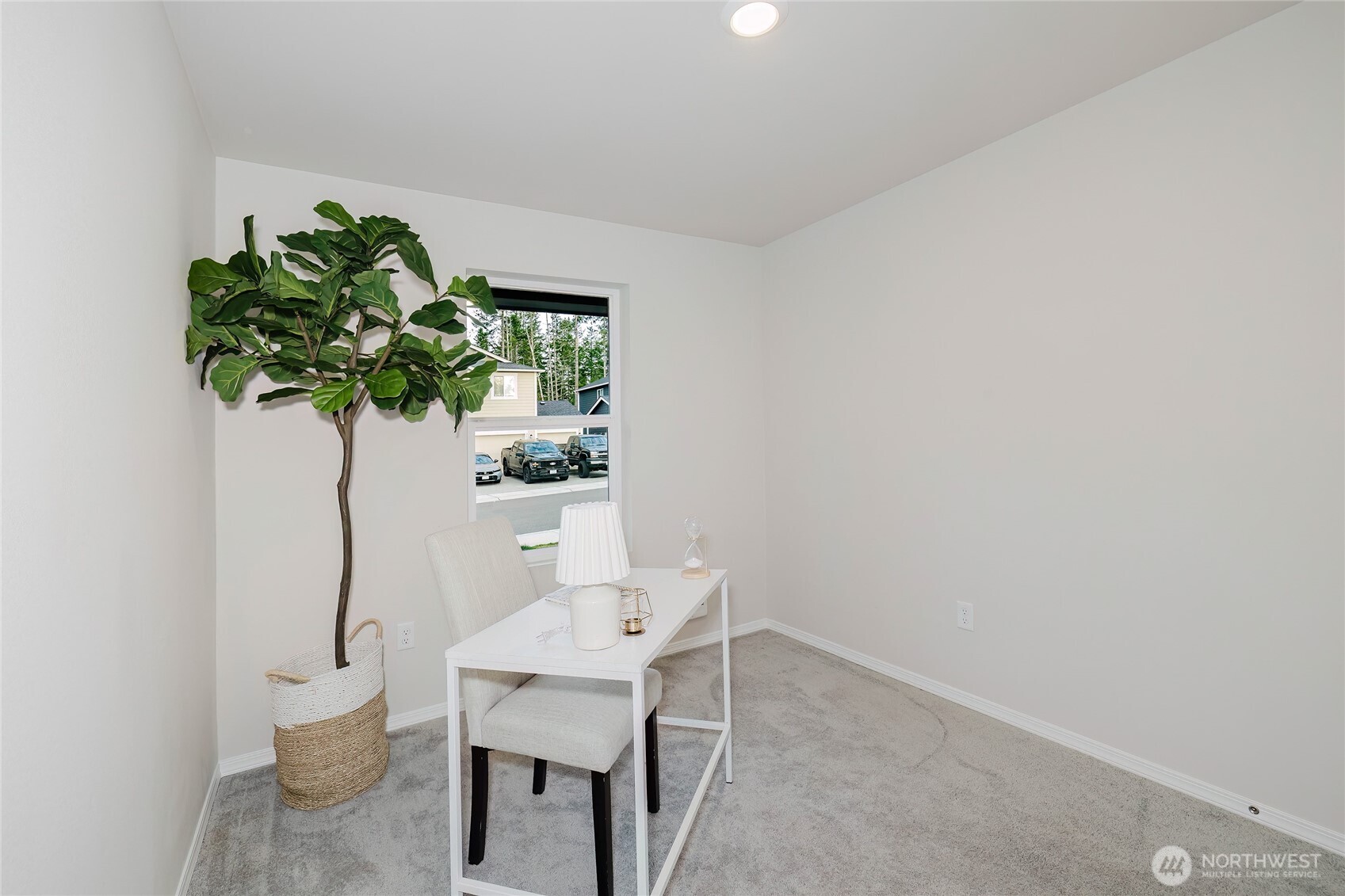 240 Northeast Olympic Ridge Belfair, WA 98528 - Photo 25 of 28 a vase of flowers sitting on a table