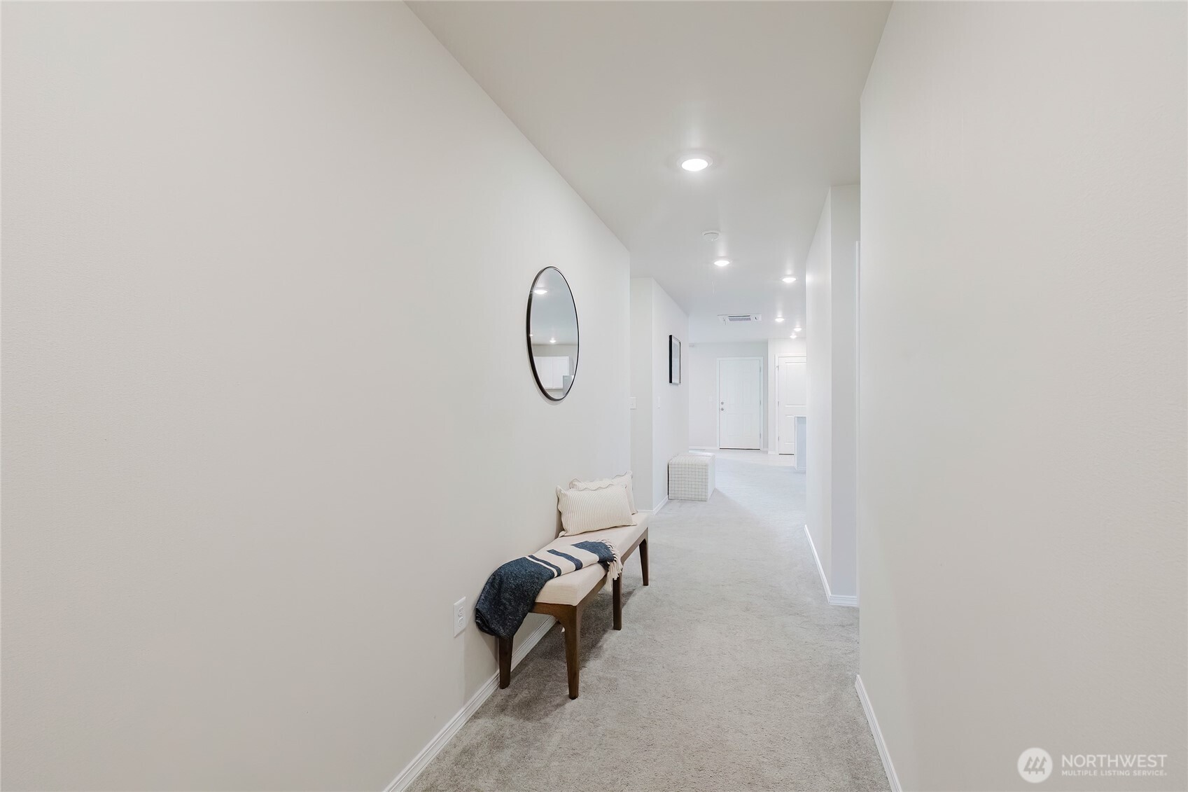 240 Northeast Olympic Ridge Belfair, WA 98528 - Photo 5 of 28 a view of a room with a table and a chair