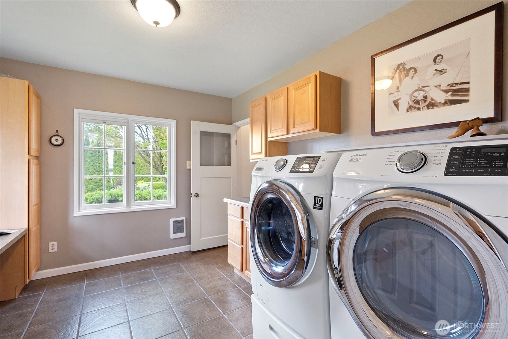 659 Alta Vista Place Fircrest, WA 98466 - Photo 15 of 40 a view of a hallway with washer and dryer
