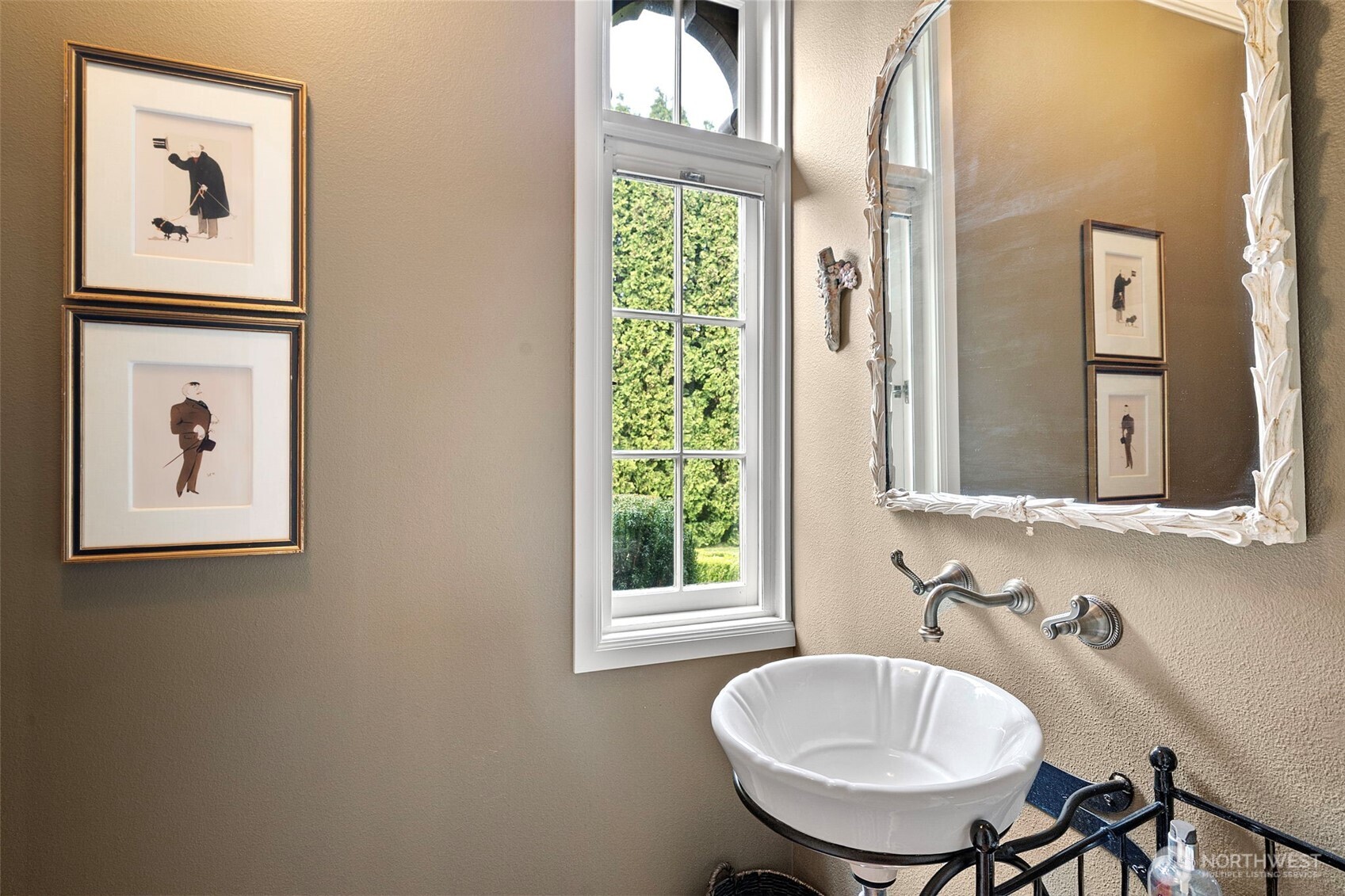659 Alta Vista Place Fircrest, WA 98466 - Photo 17 of 40 a bathroom with a sink a mirror and a window