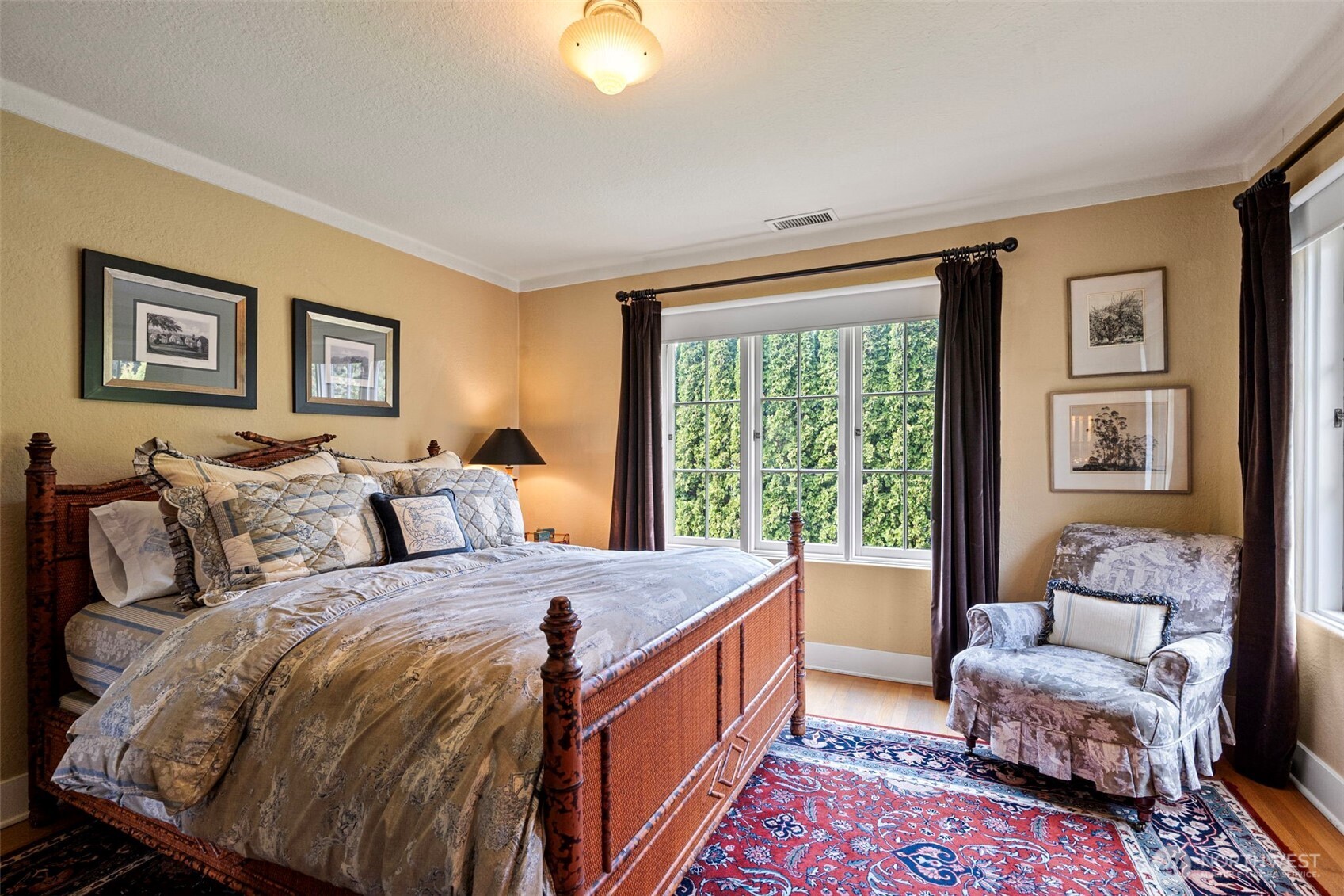 659 Alta Vista Place Fircrest, WA 98466 - Photo 19 of 40 a bed room with a bed and a couch