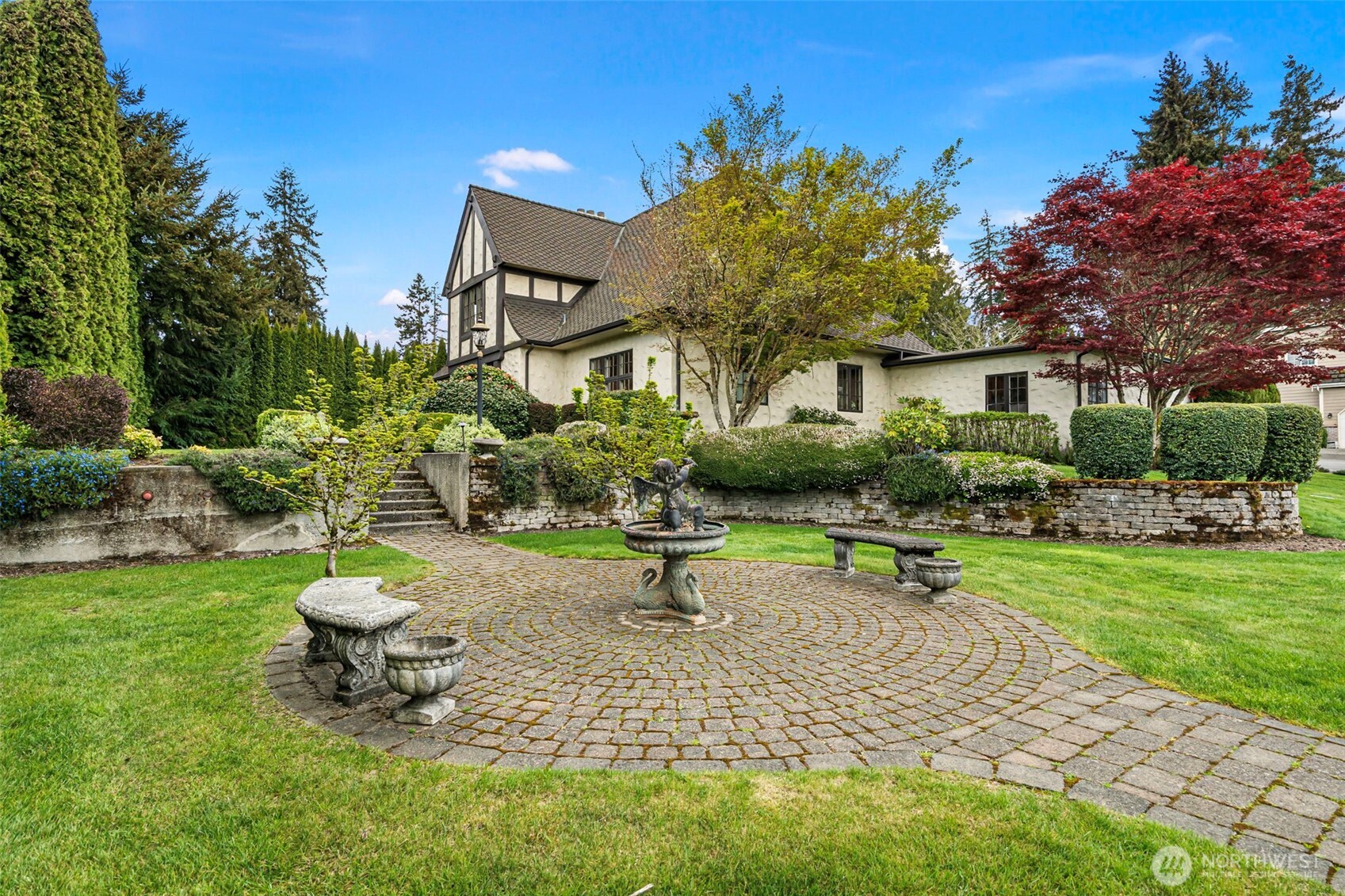 659 Alta Vista Place Fircrest, WA 98466 - Photo 33 of 40 a house view with a garden space