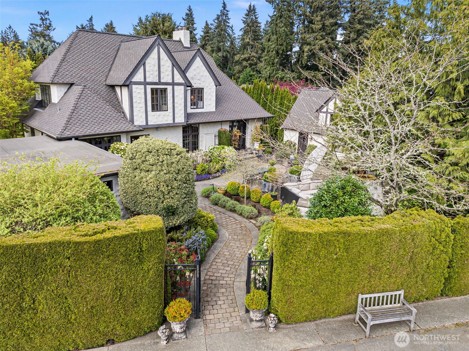 659 Alta Vista Place Fircrest, WA 98466 - Photo 38 of 40 a view of a house with a yard and potted plants