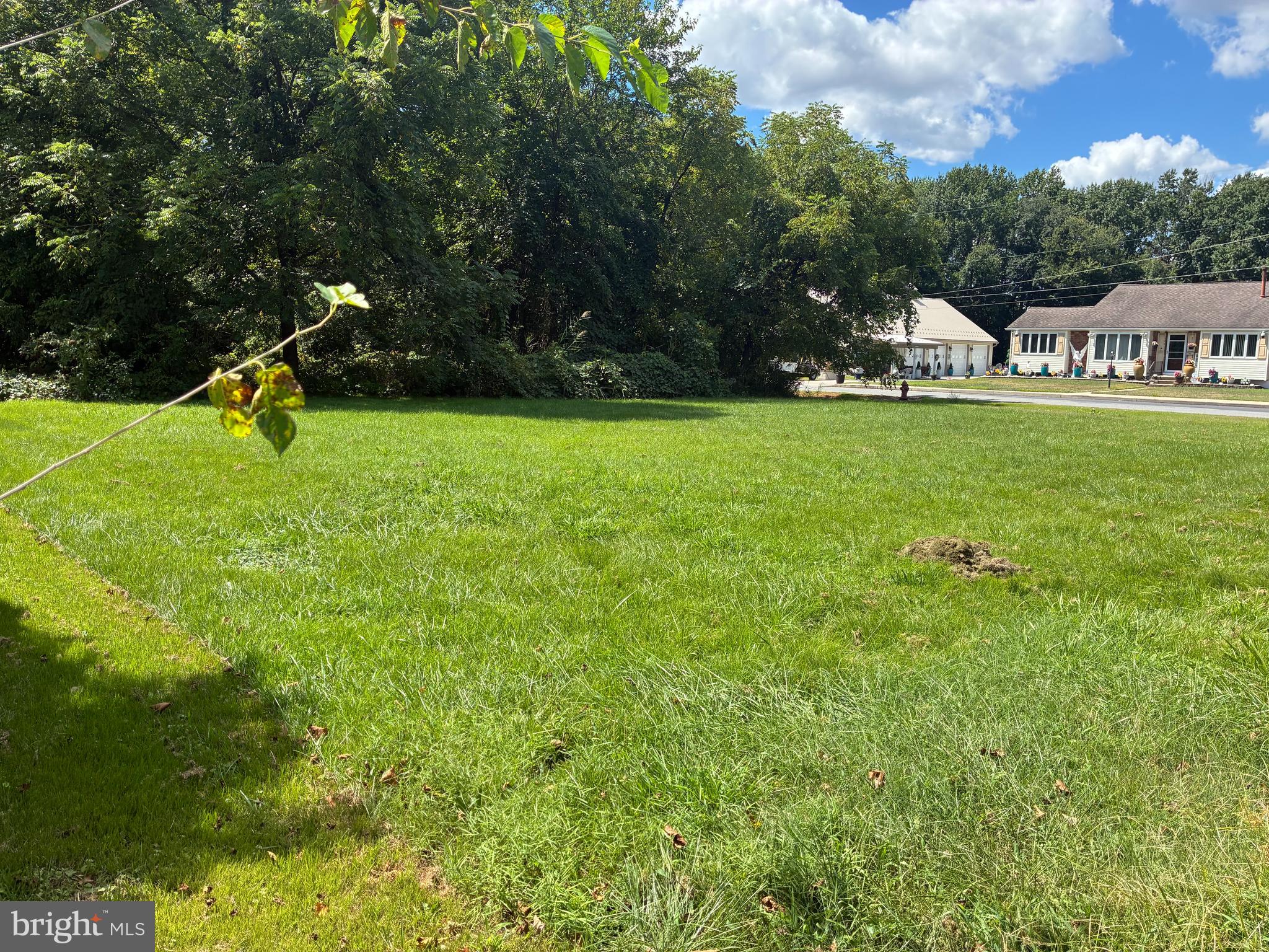 28 4th Avenue Carneys Point, NJ 08069 - Photo 3 of 7 a view of a green field with sitting area