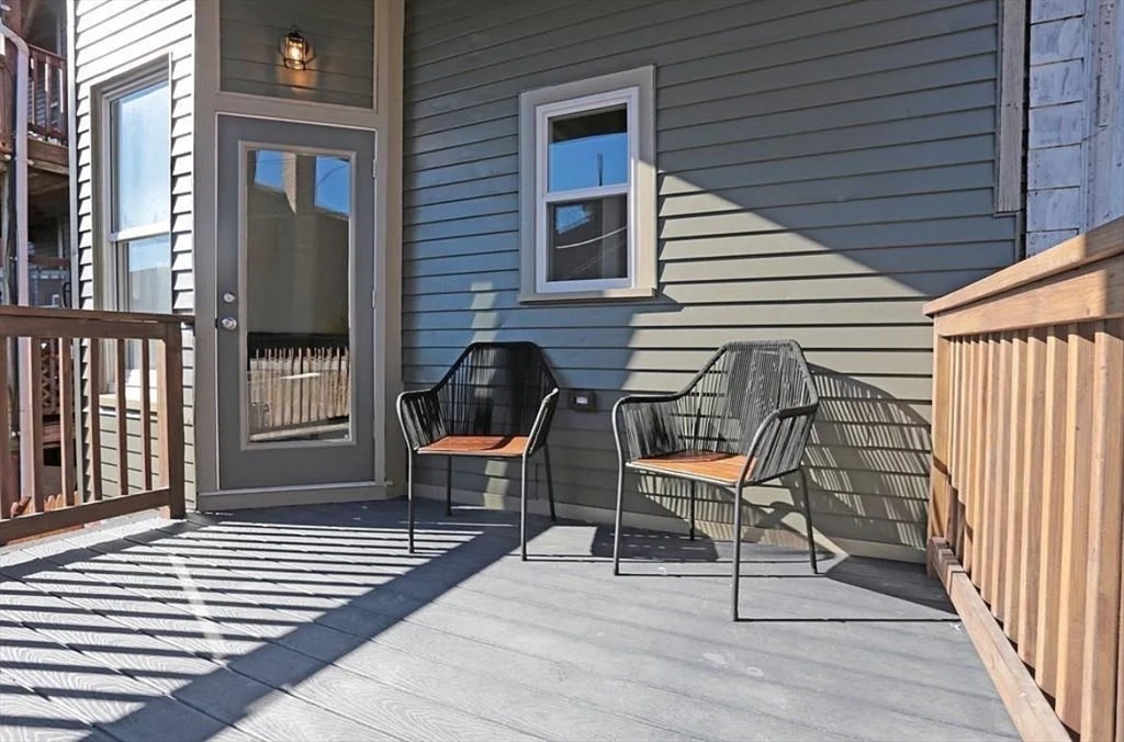 249 Lexington Street, Unit 2 Boston, MA 02128 - Photo 14 of 19 a porch with seating space