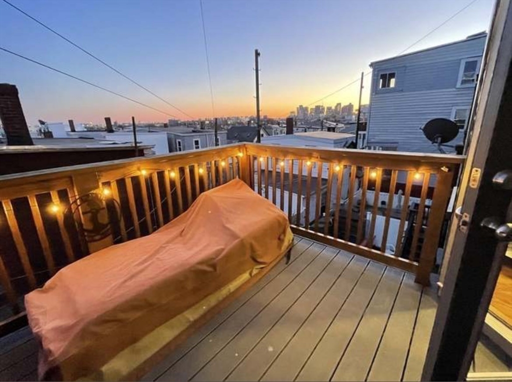 249 Lexington Street, Unit 2 Boston, MA 02128 - Photo 16 of 19 a view of balcony with furniture