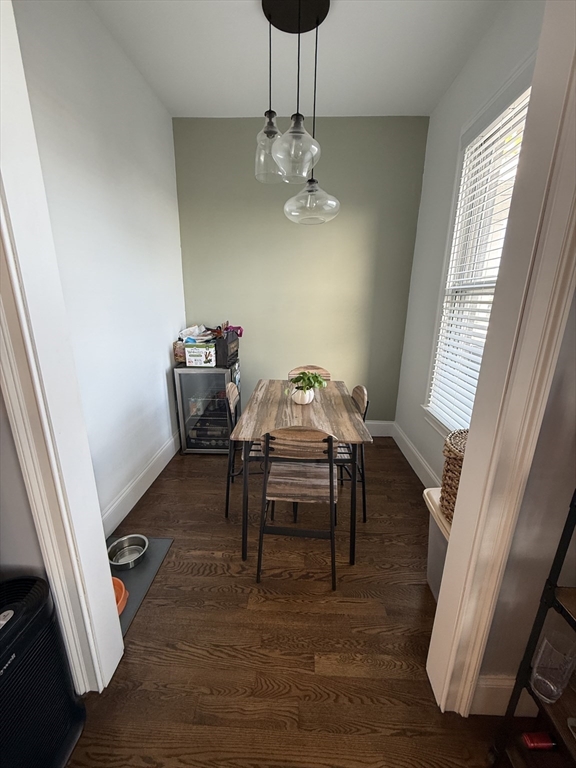 249 Lexington Street, Unit 2 Boston, MA 02128 - Photo 8 of 19 a view of a dining room with furniture and wooden floor