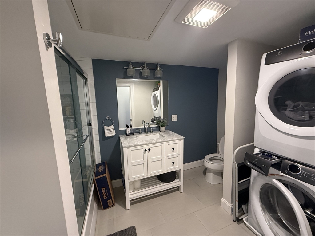 249 Lexington Street, Unit 2 Boston, MA 02128 - Photo 10 of 19 a room with a washer and dryer