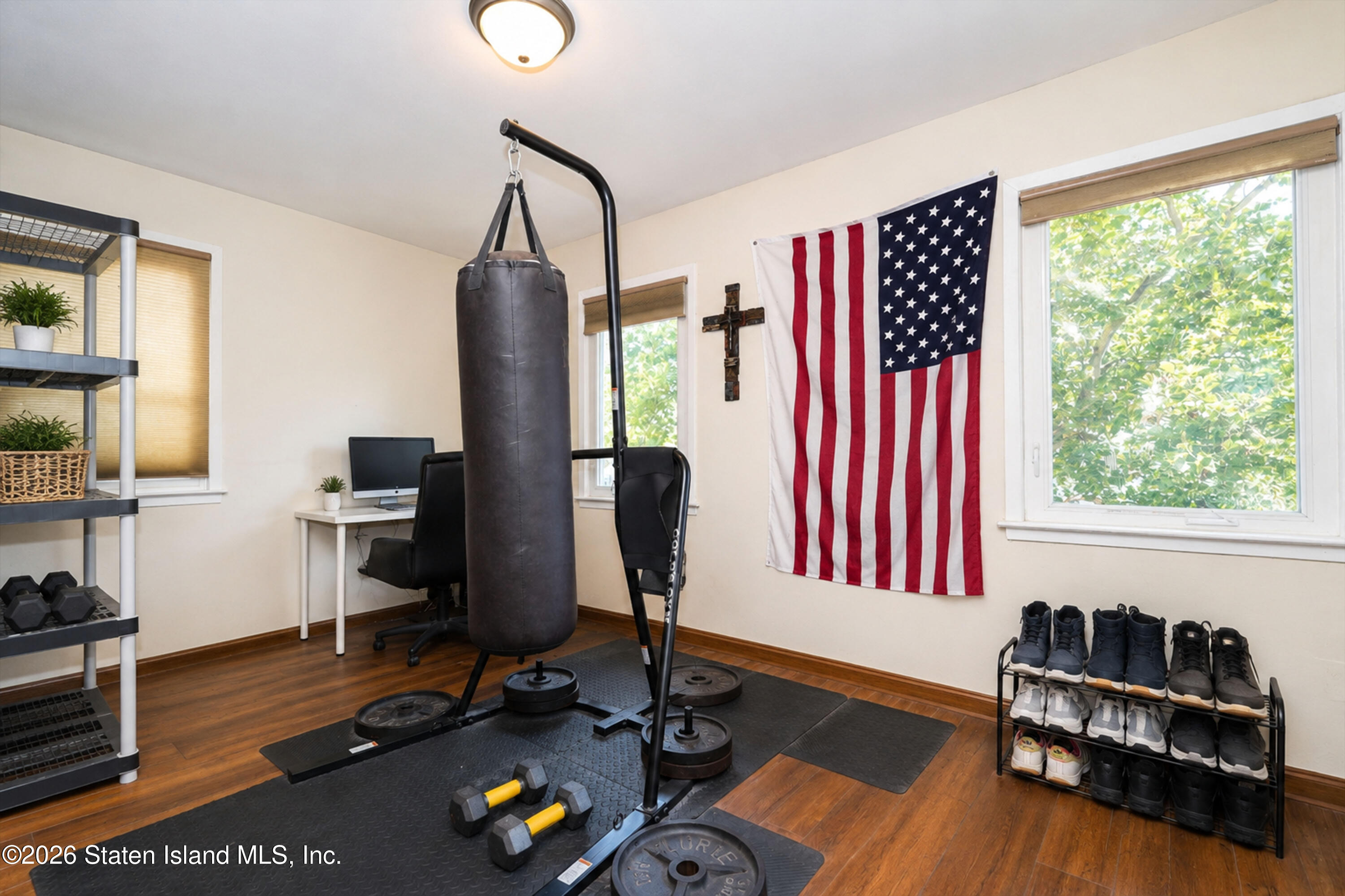 37 Middle Loop Road Staten Island, NY 10308 - Photo 26 of 38 a living room with furniture rug and a window