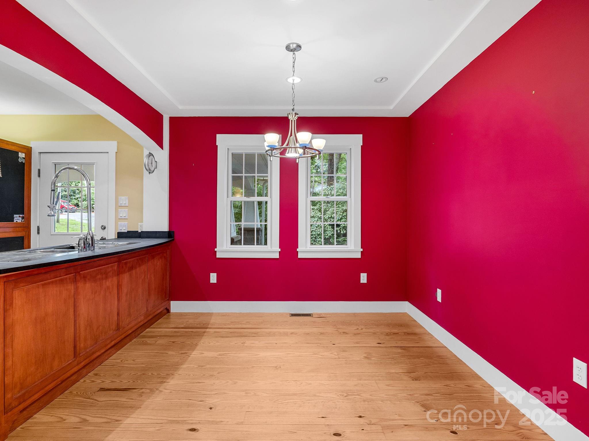 147 Woodland Road Tryon, NC 28782 - Photo 16 of 48 a view of swimming pool with red chair