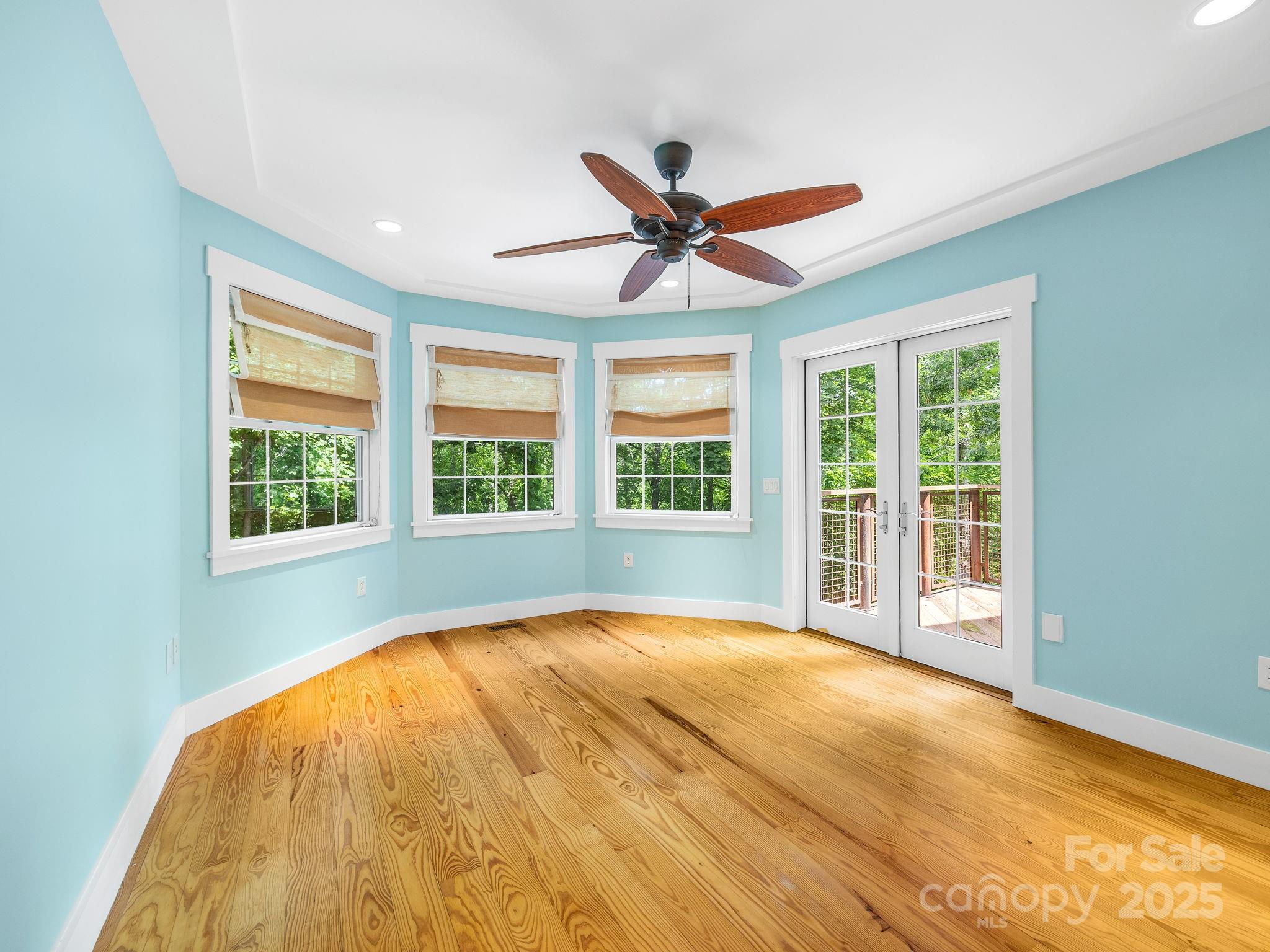 147 Woodland Road Tryon, NC 28782 - Photo 21 of 48 a view of an empty room with a large window