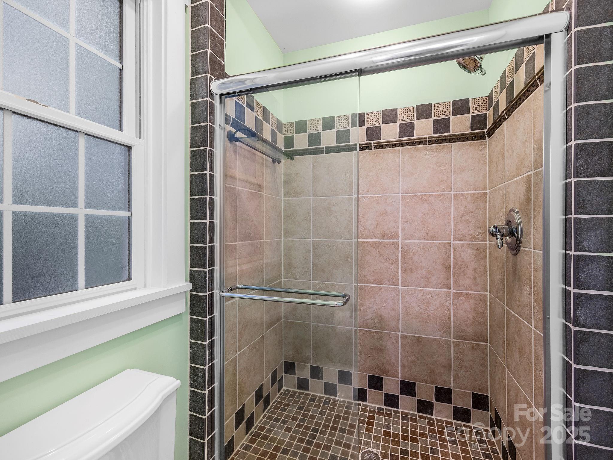 147 Woodland Road Tryon, NC 28782 - Photo 24 of 48 a bathroom with a shower
