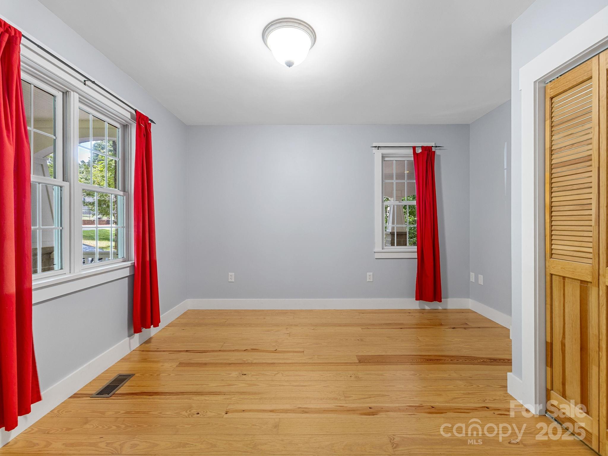 147 Woodland Road Tryon, NC 28782 - Photo 25 of 48 a view of an empty room with a window