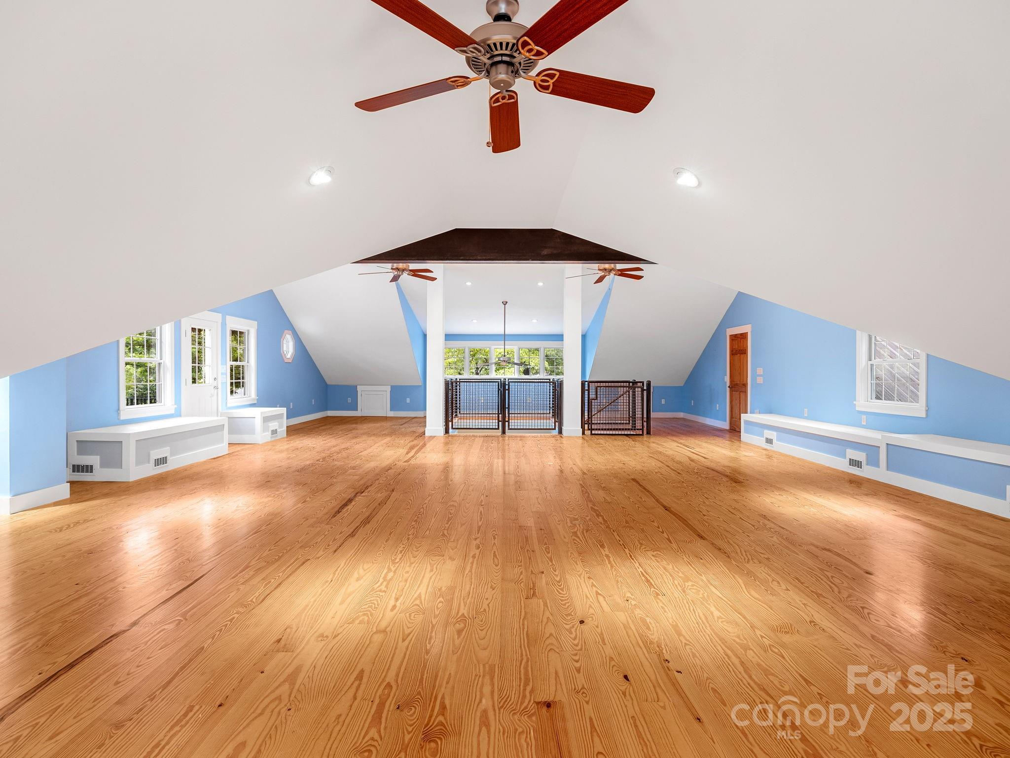 147 Woodland Road Tryon, NC 28782 - Photo 34 of 48 a view of an empty room with window and wooden floor