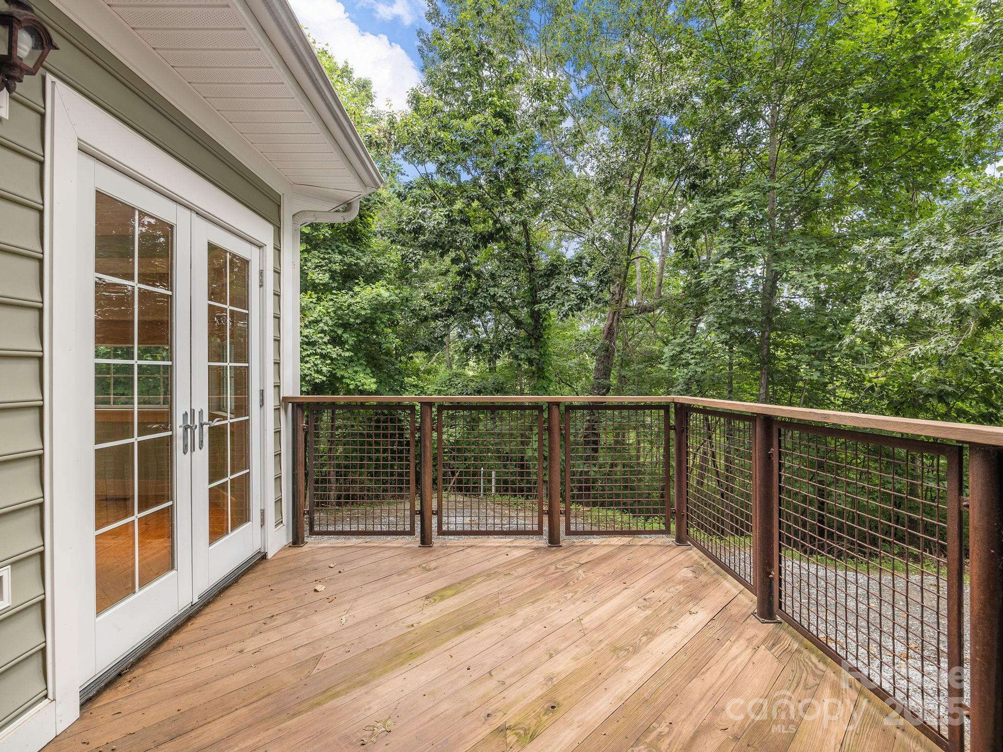 147 Woodland Road Tryon, NC 28782 - Photo 43 of 48 a view of balcony with wooden floor