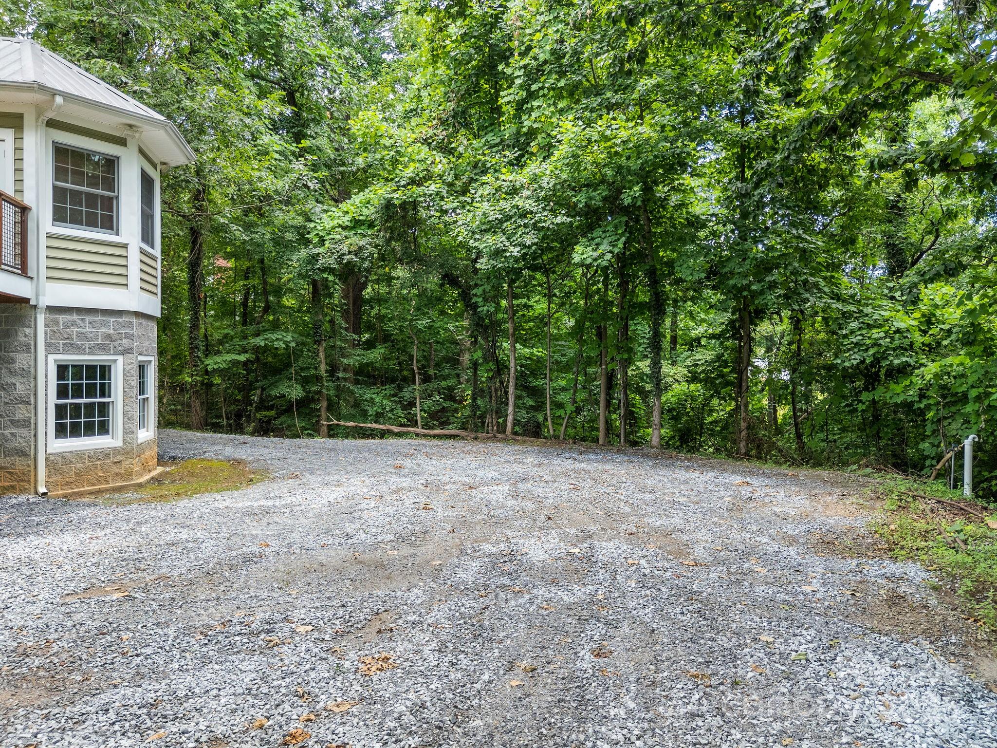 147 Woodland Road Tryon, NC 28782 - Photo 47 of 48 a view of a house with a swimming pool
