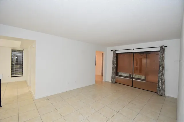 an empty room with sliding door