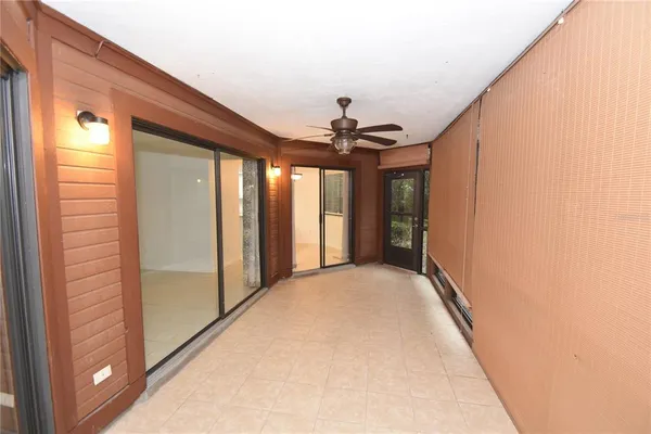 a view of a hallway with windows