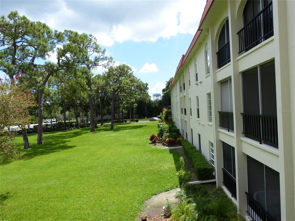 2700 Bayshore Boulevard, Unit 1302 Dunedin, FL 34698 - Photo 1 of 40 a view of an house with backyard and garden