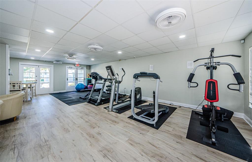 2700 Bayshore Boulevard, Unit 1302 Dunedin, FL 34698 - Photo 27 of 40 a view of a room with gym equipment