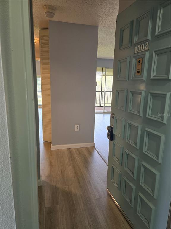 2700 Bayshore Boulevard, Unit 1302 Dunedin, FL 34698 - Photo 8 of 40 a view of livingroom with furniture and window