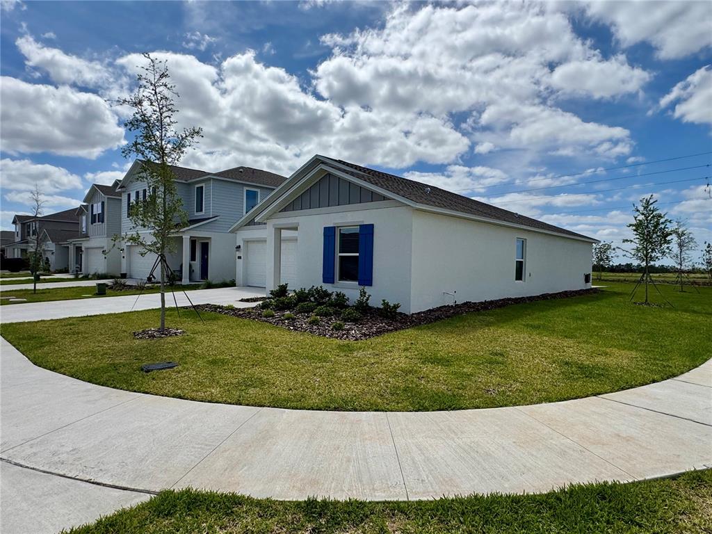 2405 Bluestone Road Haines City, FL 33844 - Photo 3 of 17 a backyard of a house with lots of green space