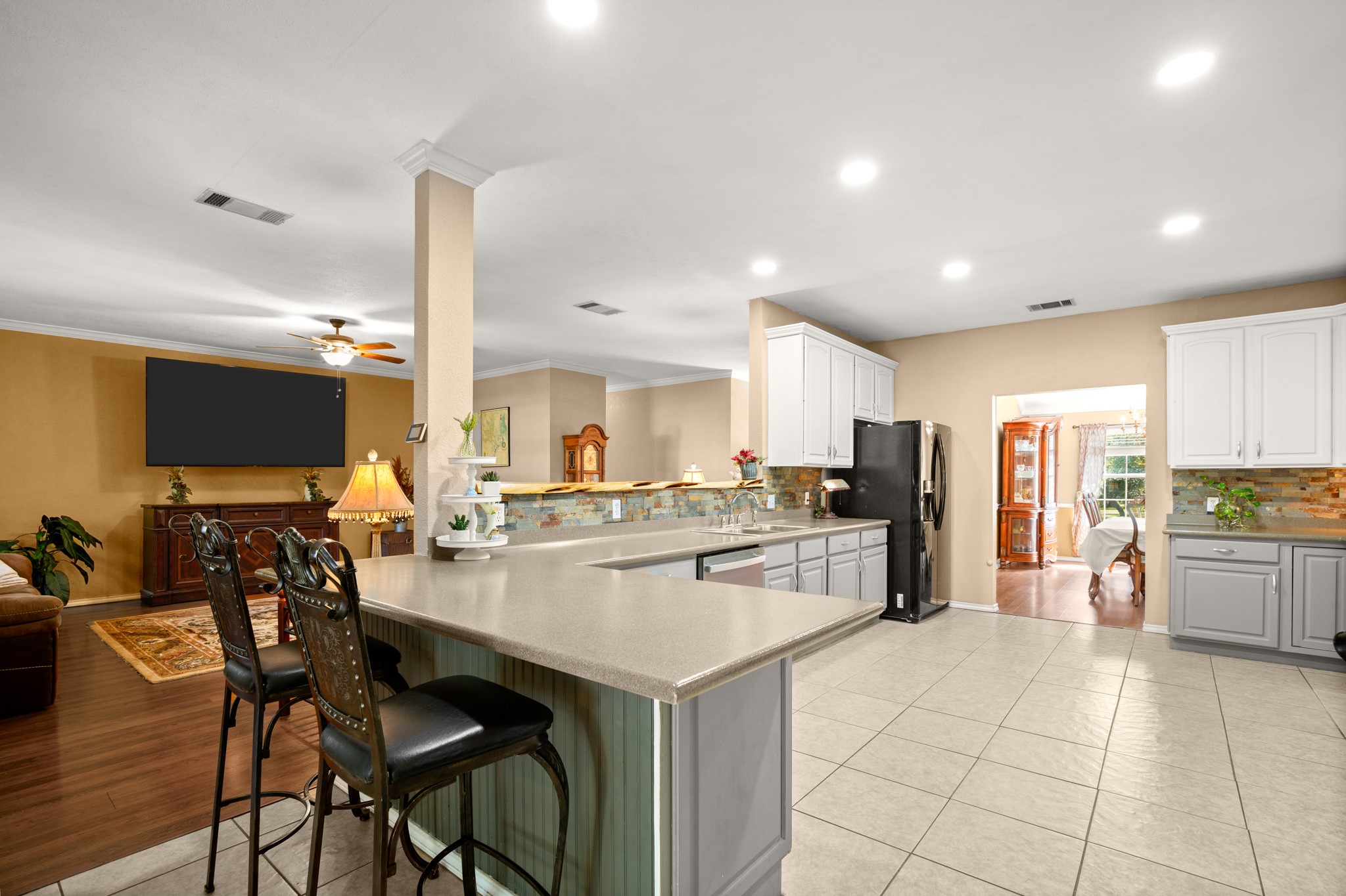 350 Lost River Road Georgetown, TX 78628 - Photo 13 of 39 The integrated kitchen, dining, and great room allow for a warm space to gather, entertain, and celebrate.
