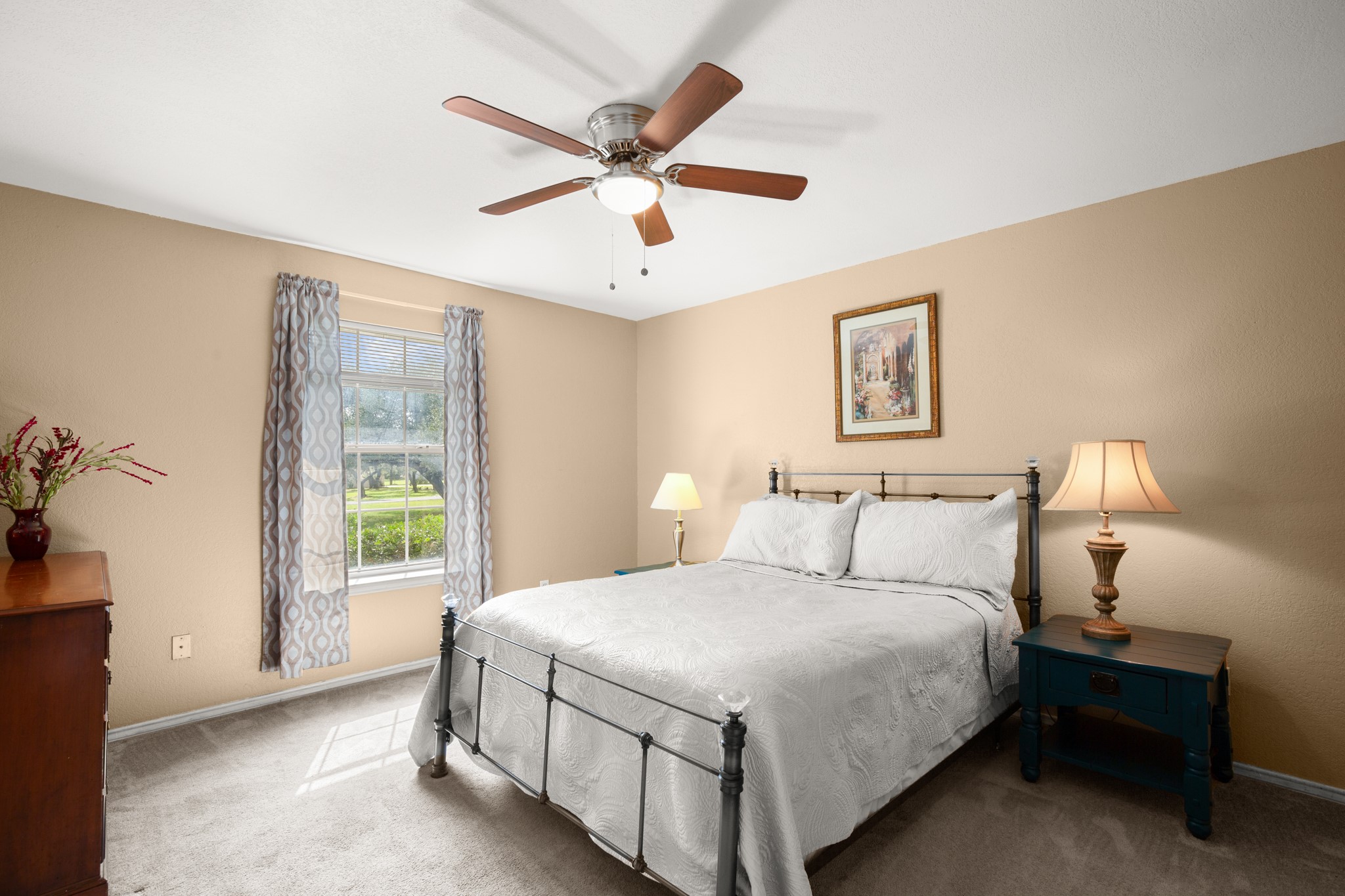 350 Lost River Road Georgetown, TX 78628 - Photo 22 of 39 Third bedroom with plush carpet and a ceiling fan.
