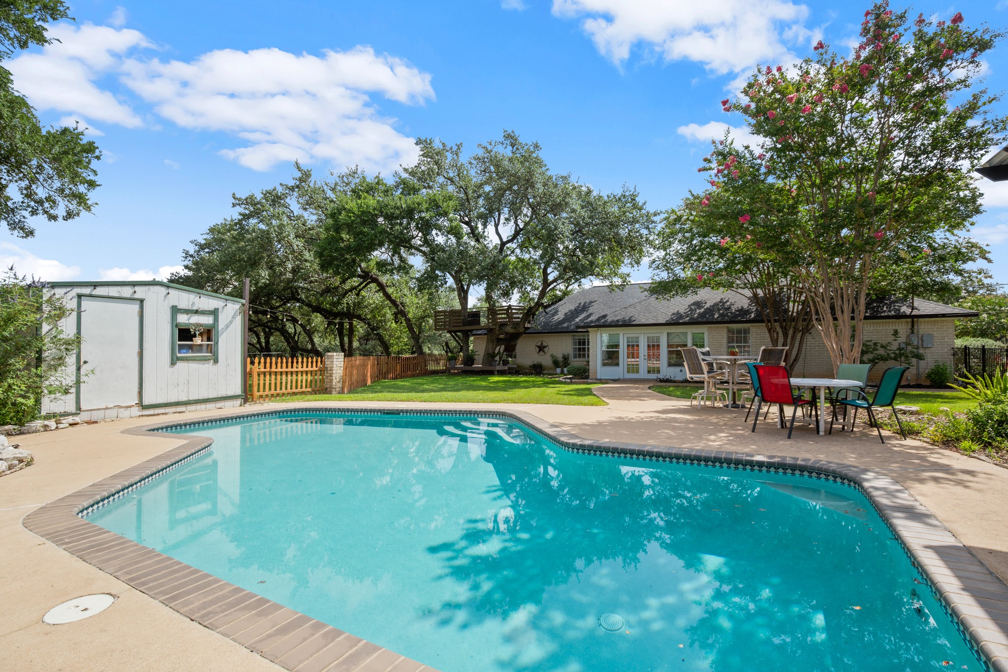 350 Lost River Road Georgetown, TX 78628 - Photo 23 of 39 Imagine a cool dip on a hot Texas day. You also have a shed to store all of your gardening tools and pool toys.
