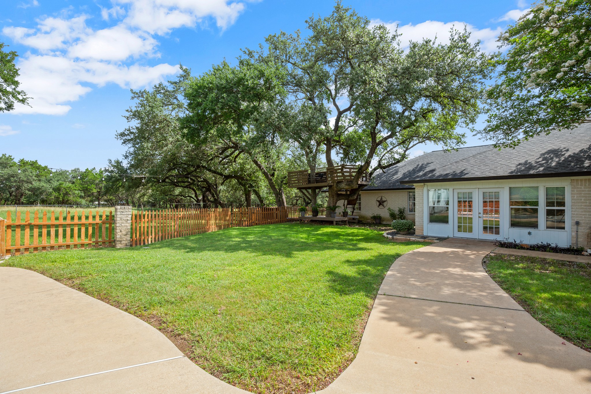 350 Lost River Road Georgetown, TX 78628 - Photo 25 of 39 View of the dog run (fenced) and back of the home.
