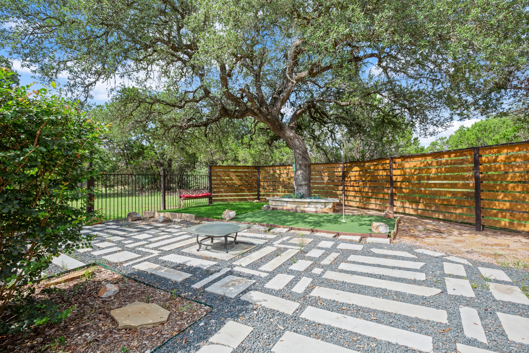 350 Lost River Road Georgetown, TX 78628 - Photo 7 of 39 The pool has added a veranda. Next to your Veranda, you have a peaceful turf area under a soaring shade tree. Practice your putting in style in this space.