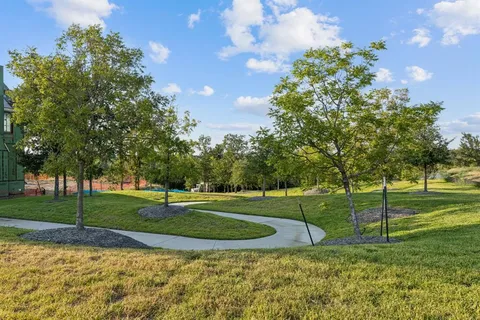 a view of a house with a big yard