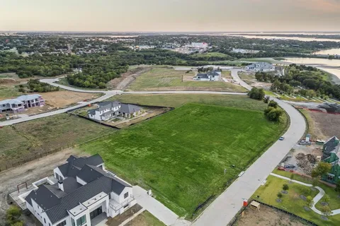 a view of a green field with clear sky