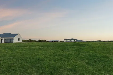 a view of a lake with a big yard