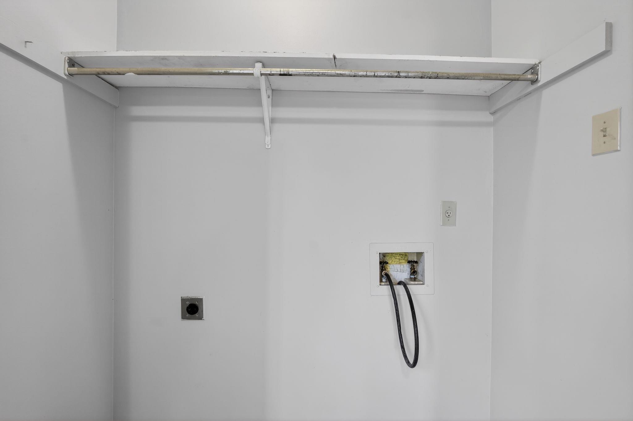 5581 Crepe Myrtle Drive Memphis, TN 38115 - Photo 30 of 33 Laundry area with washer hookup and hookup for an electric dryer