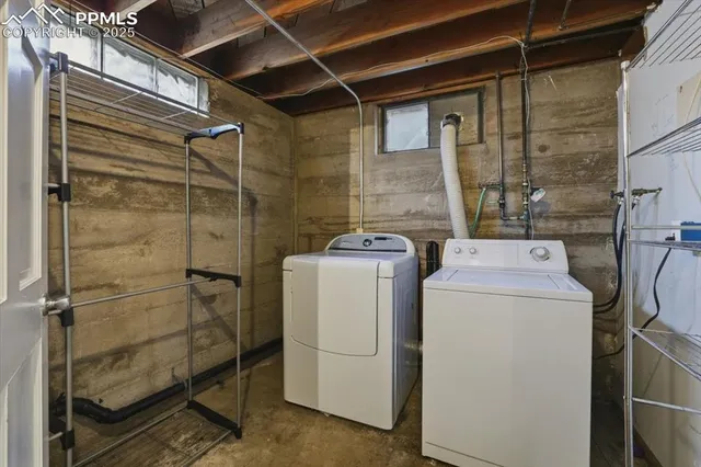 a utility room with dryer and washer