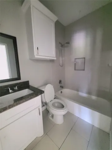 a view of balcony with deck and wooden floor