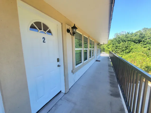 a room with a black white checkered floor