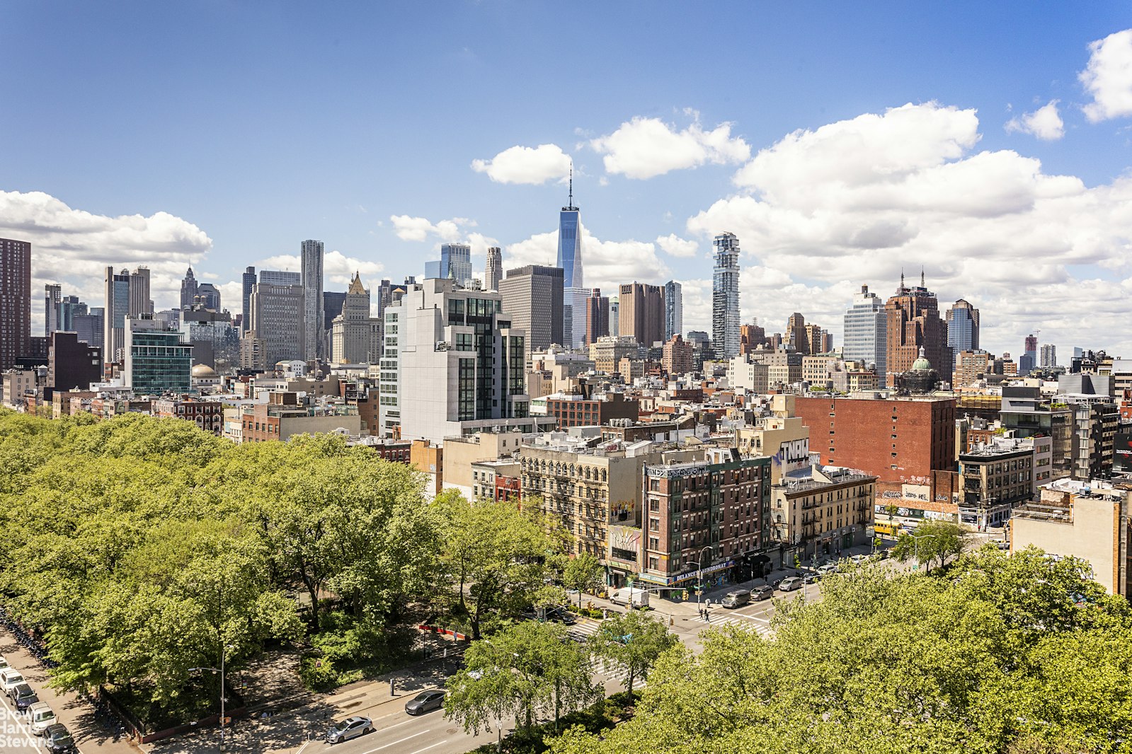 38 Delancey Street, Unit 10D Manhattan, NY 10002 - Photo 10 of 14 a view of a city with tall buildings