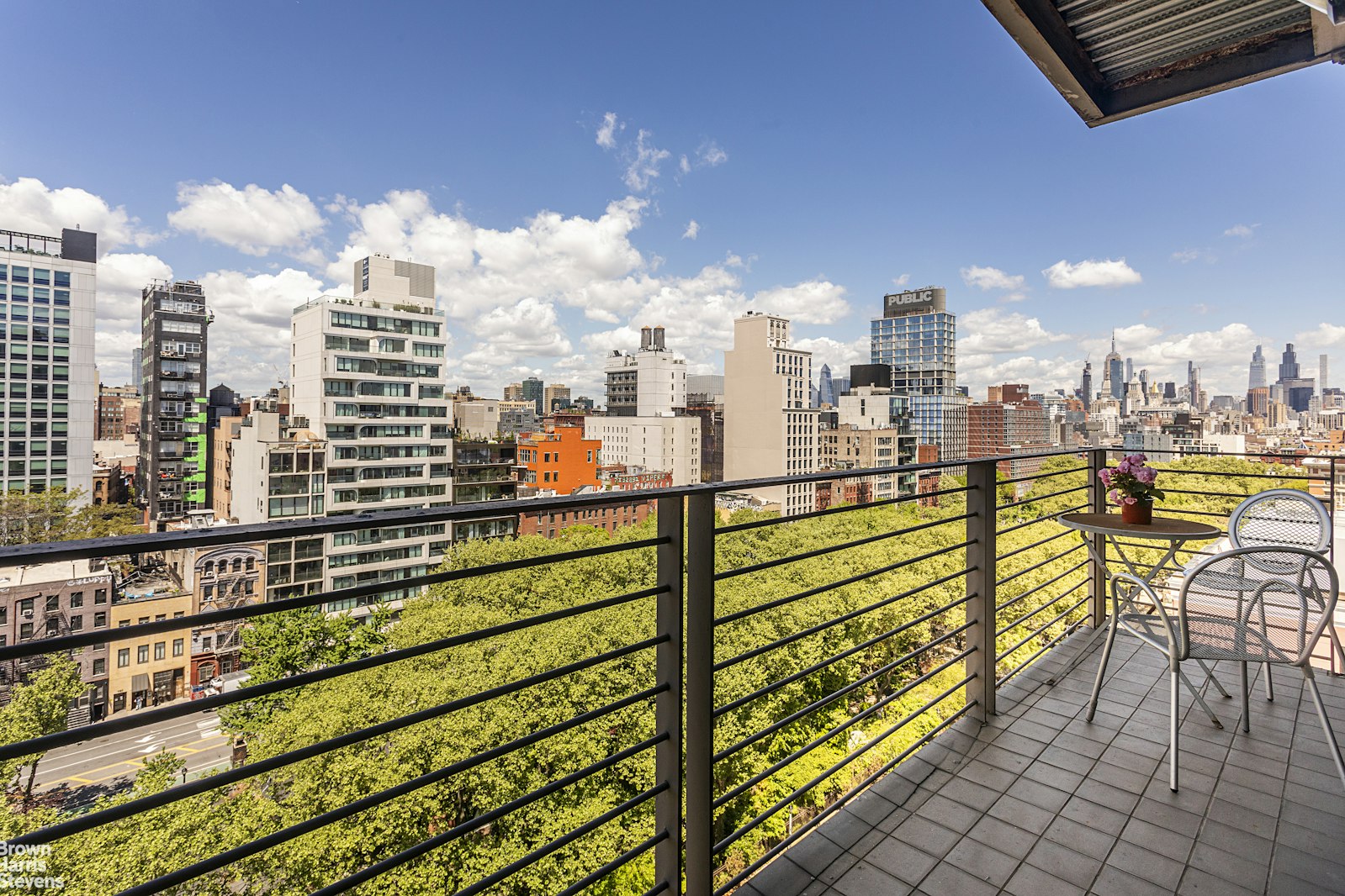 38 Delancey Street, Unit 10D Manhattan, NY 10002 - Photo 9 of 14 a view of a city with sitting area
