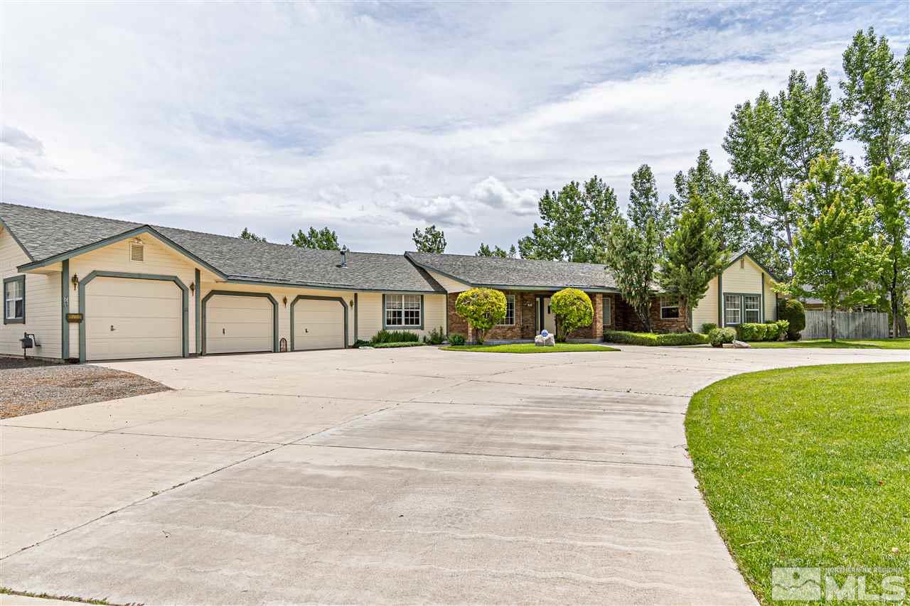 761 Rubio Way Gardnerville, NV 89460 - Photo 1 of 30 a view of houses with outdoor space and swimming pool