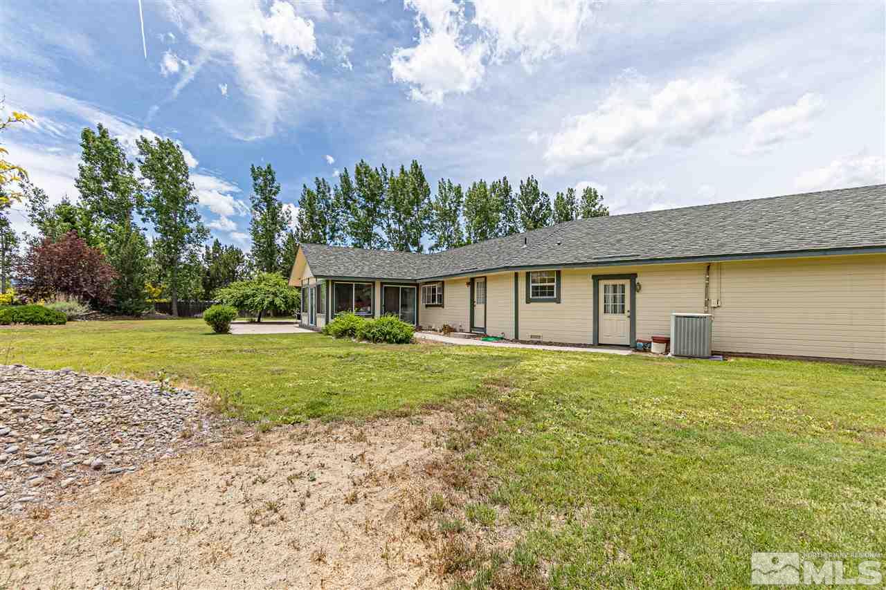761 Rubio Way Gardnerville, NV 89460 - Photo 27 of 30 a front view of a house with garden