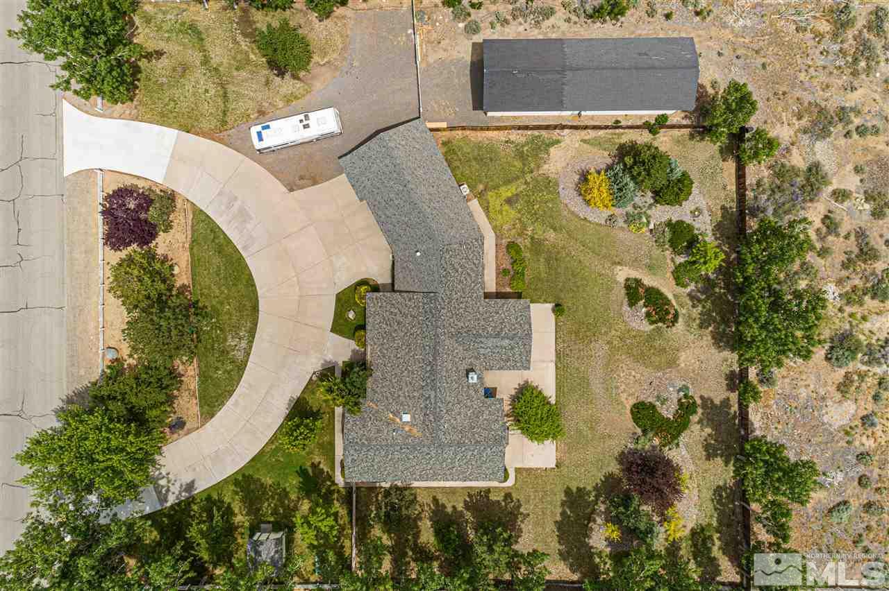 761 Rubio Way Gardnerville, NV 89460 - Photo 4 of 30 an aerial view of a house with a yard and trees