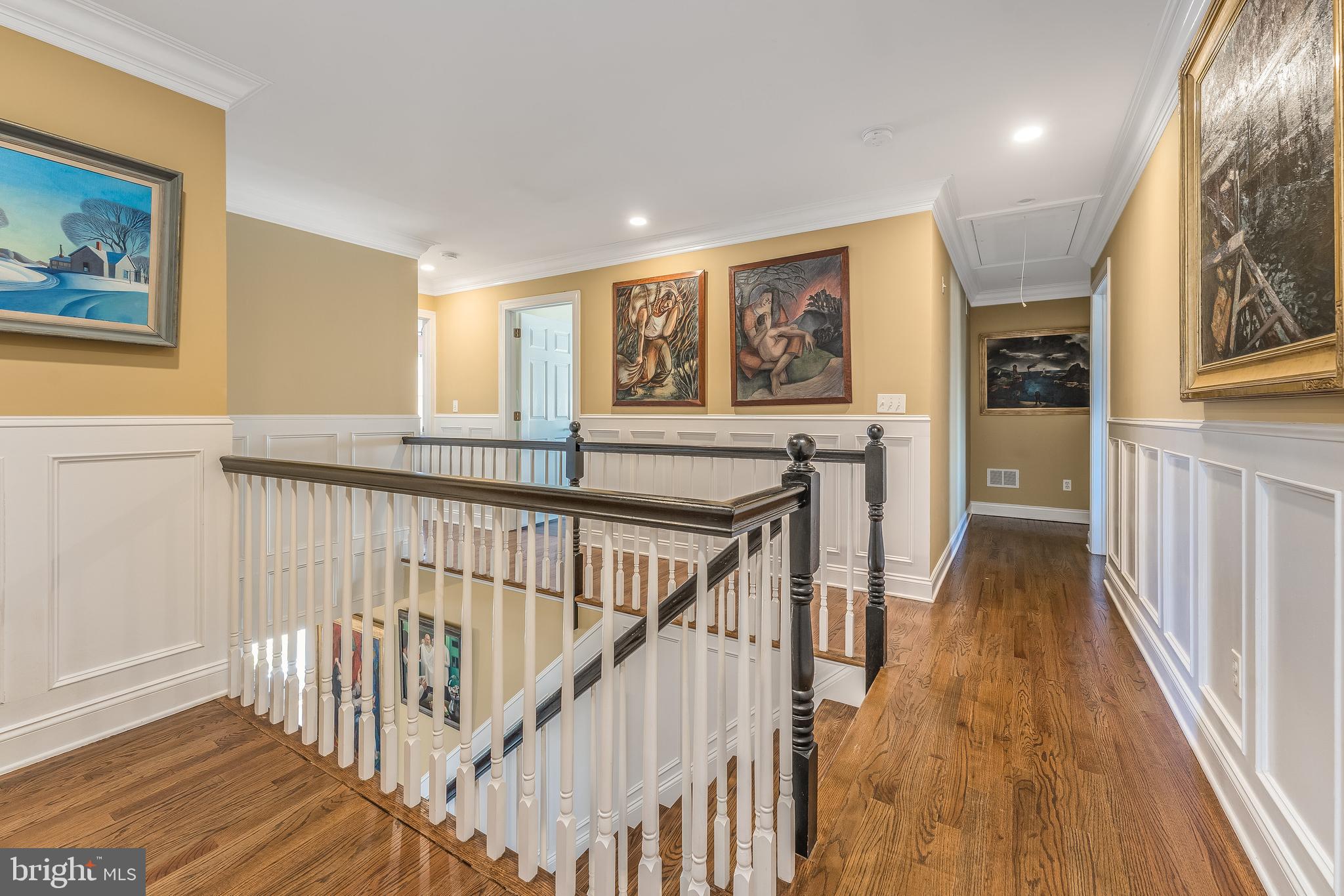 27 Milestone Drive Ringoes, NJ 08551 - Photo 28 of 75 a view of a hallway with wooden floor and staircase