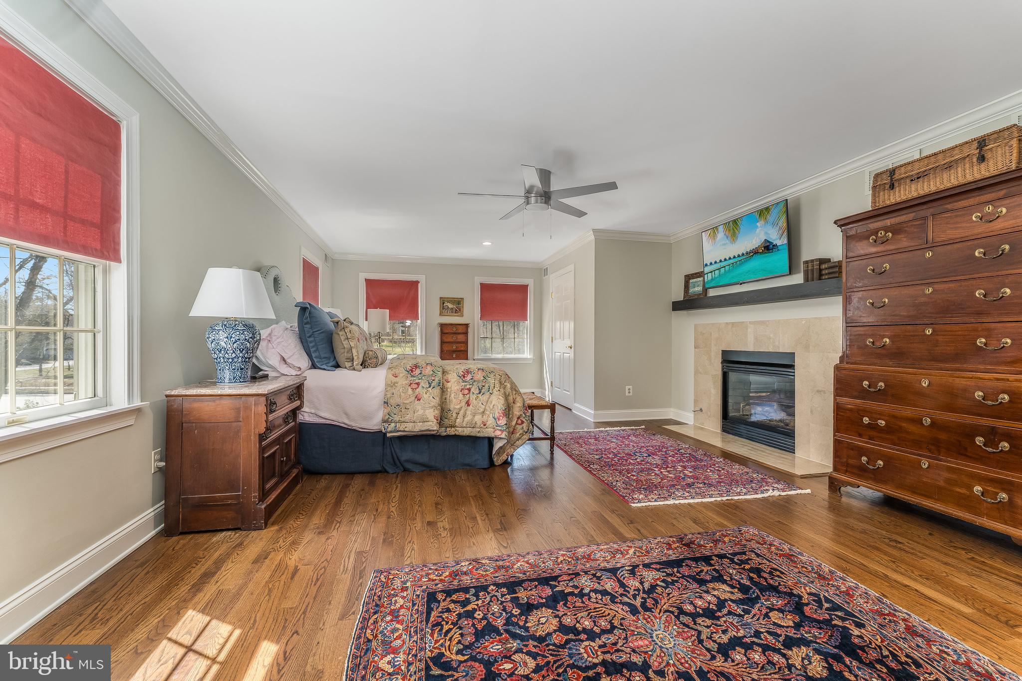 27 Milestone Drive Ringoes, NJ 08551 - Photo 29 of 75 a living room with furniture and a fireplace