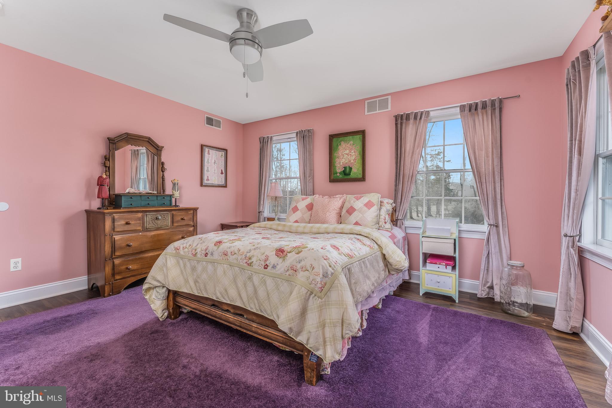 27 Milestone Drive Ringoes, NJ 08551 - Photo 37 of 75 a spacious bedroom with a bed and a dresser